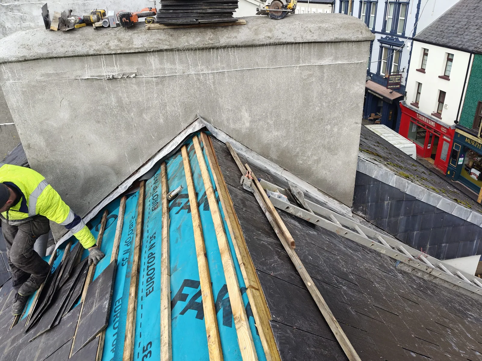 Roof around a chimney with new battens and breathable underlay